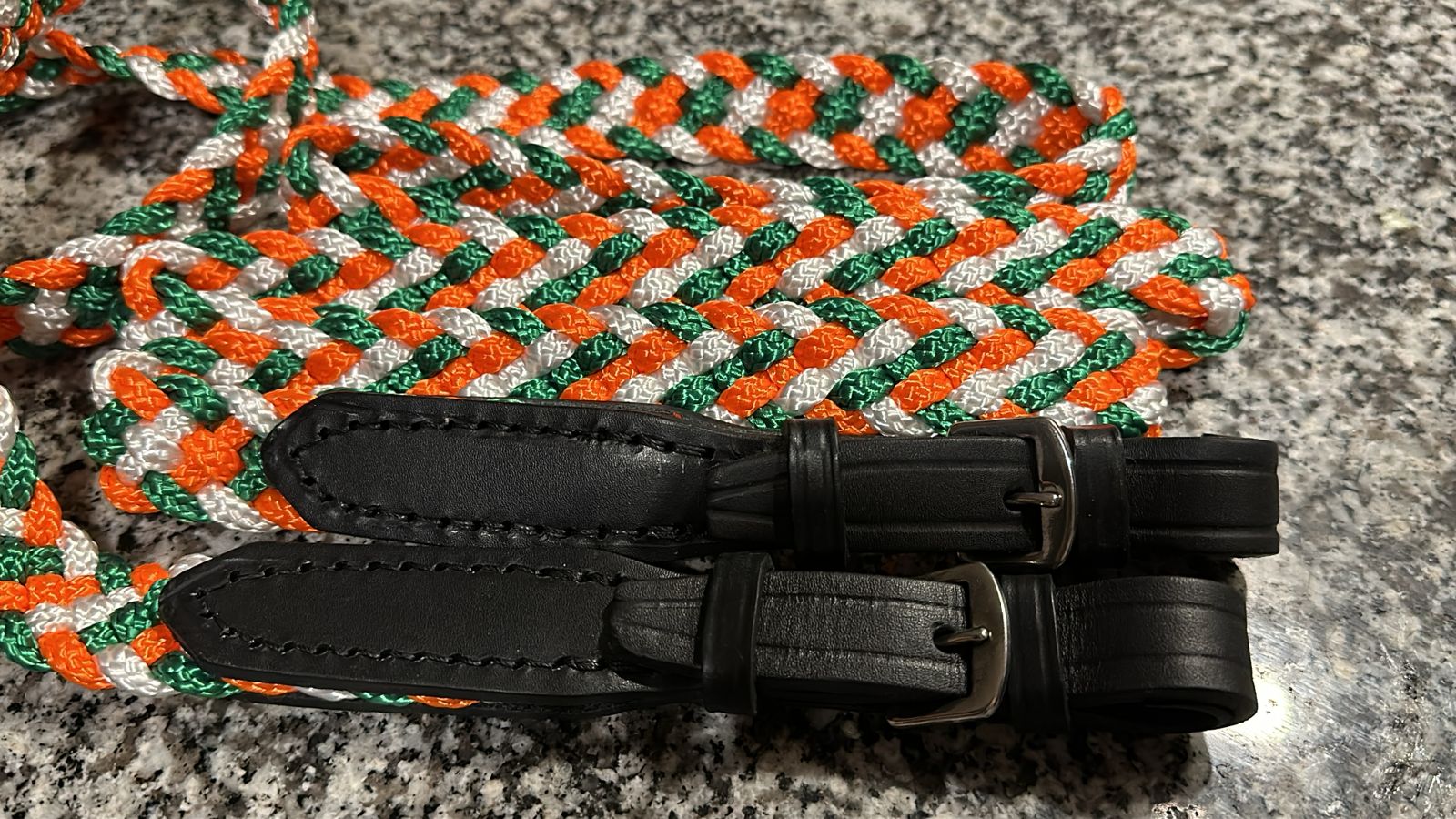 Platted reins in Irish colours.